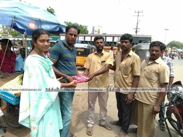 Auto driver who handed the bag of jewelry, money, cell phone with the cell